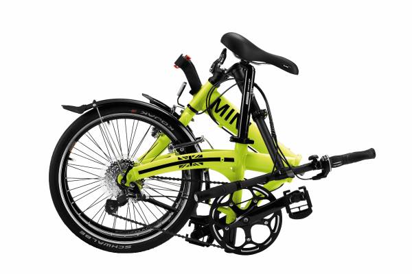 MINI Folding Bike: The new foldable MINI. Bright yellow collapsible bike  with clever accessories for the road.