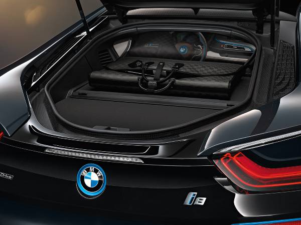 Louis Vuitton creates tailor-made luggage for the BMW i8. Forward-looking  travel bags for progressive driving made from carbon fibre.