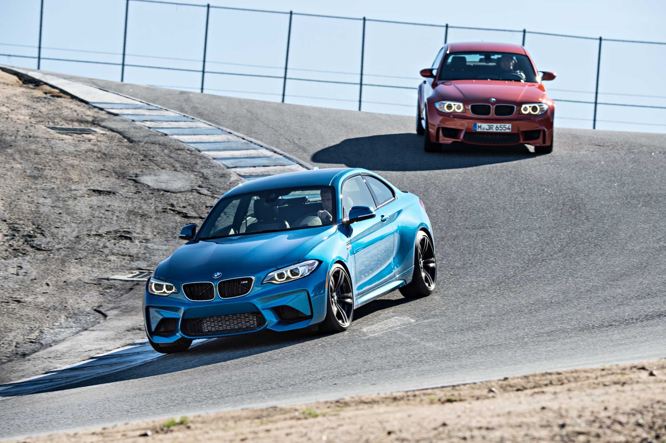 The New Bmw M2 Coupe With Its Predecessor The Bmw 1 Series M Coupe 07 16