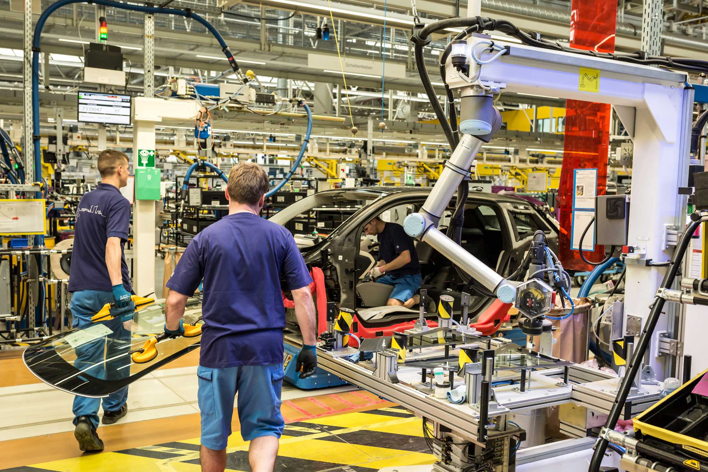 Car Factory Human work. BMW Production. Applied Robotics. Human Factory.