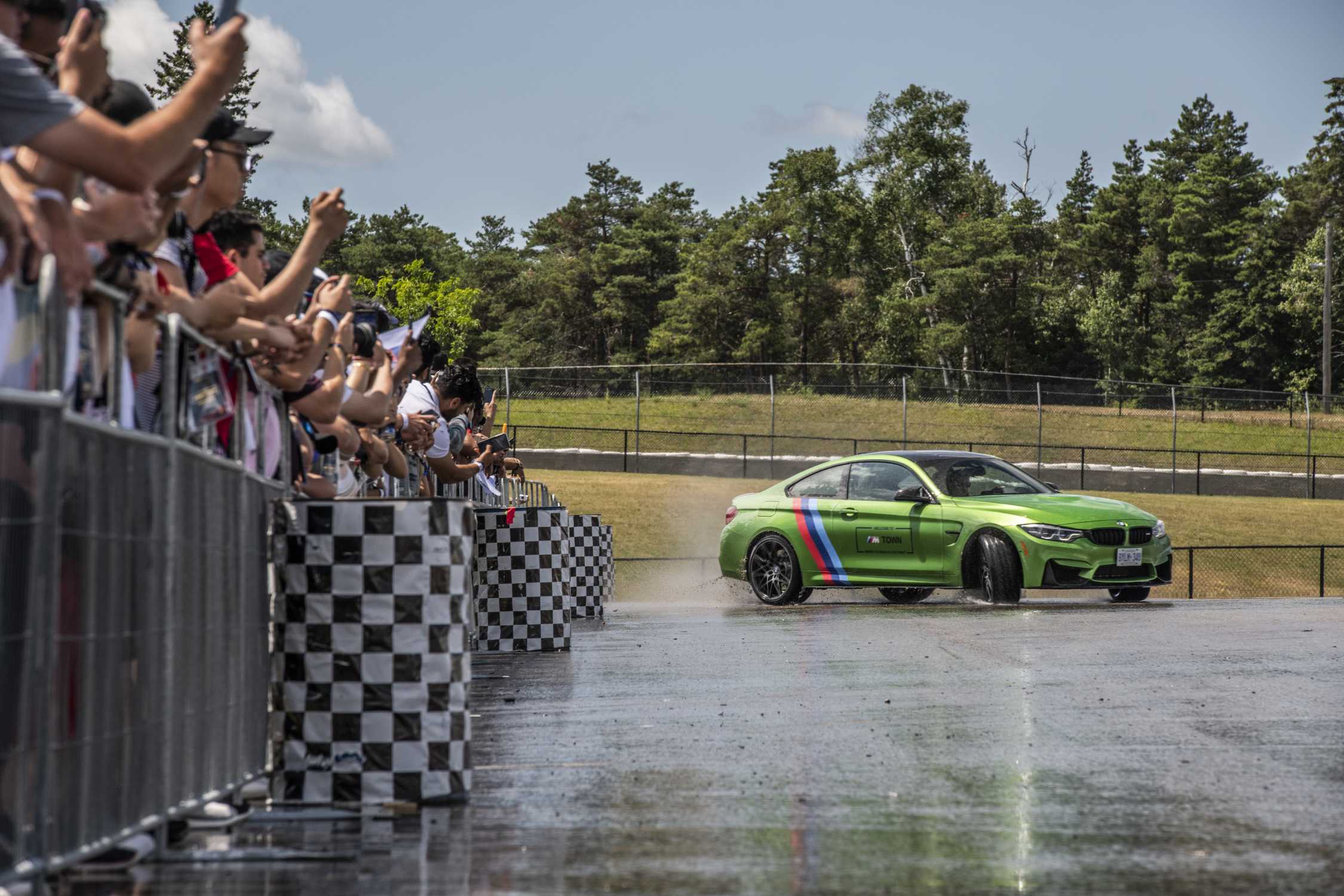 A BMW M4 performs during the drift show at the BMW M Festival. Canadian Tire Motorsport Park, Bowmanville, Ontario. (07/2019)
