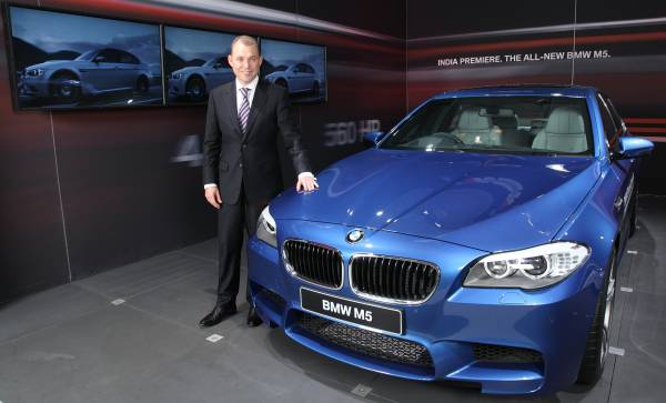 Dr. Andreas Schaaf, President, BMW Group India with the BMW M5 (02