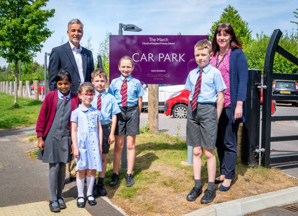 LOCAL SCHOOLCHILDREN 'SIGN OFF' NEW CAR PARK PROVIDED BY ROLLS-ROYCE MOTOR CARS