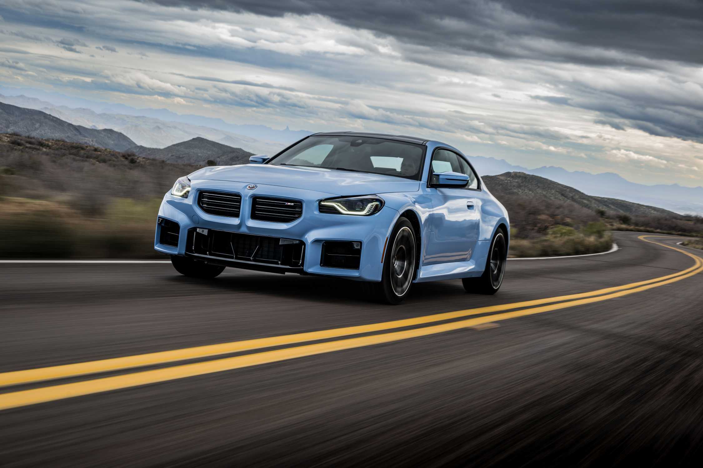 The allnew BMW M2 Zandvoort Blue On Location, driving.