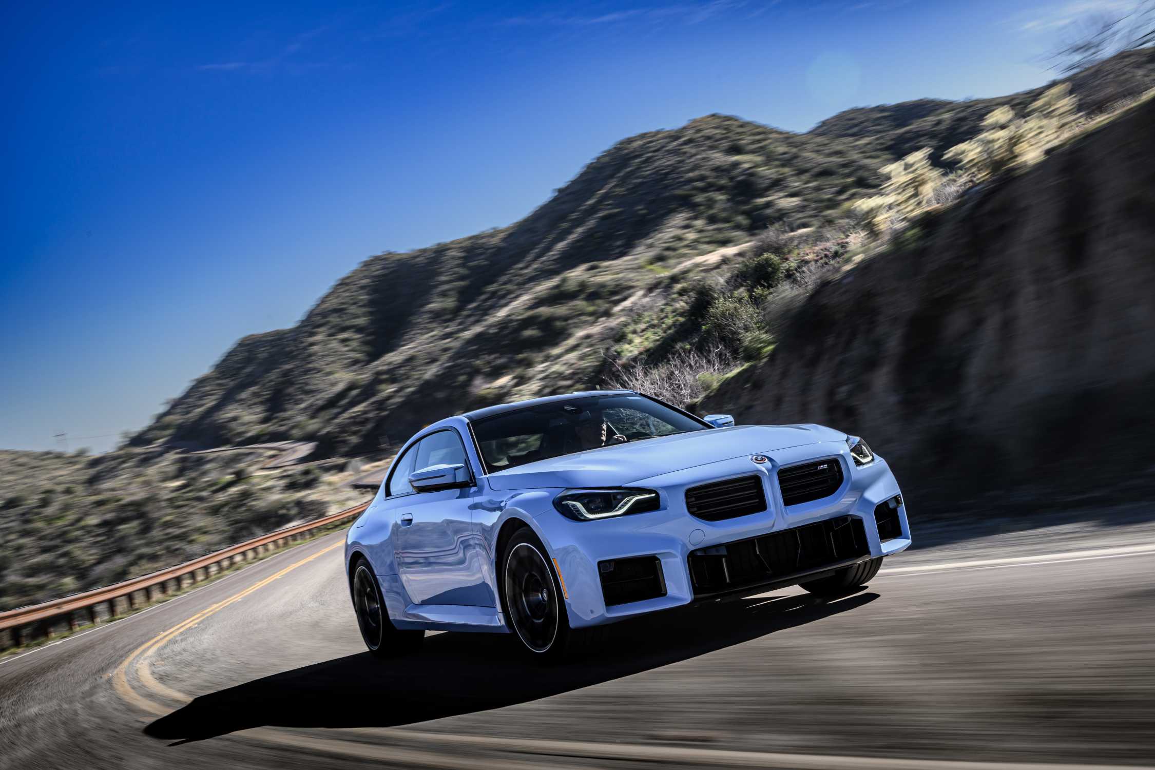 The all-new BMW M2 Zandvoort Blue - On Location, driving.