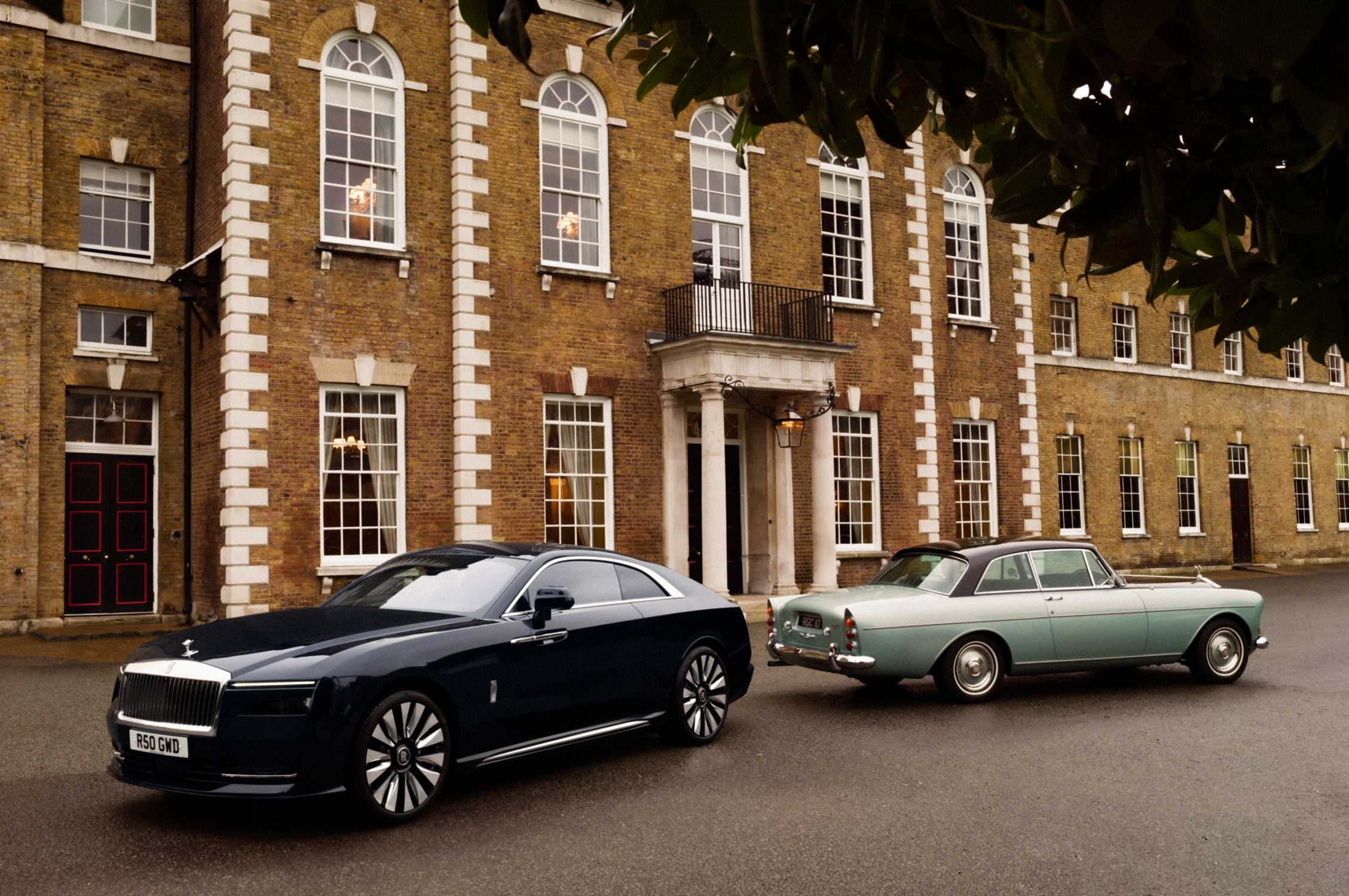 ROLLS-ROYCE SPECTRE BESIDE A 1965 ROLLS-ROYCE SILVER CLOUD COUPÉ IN ONE OF LONDON'S MOST DESIRABLE DISTRICTS