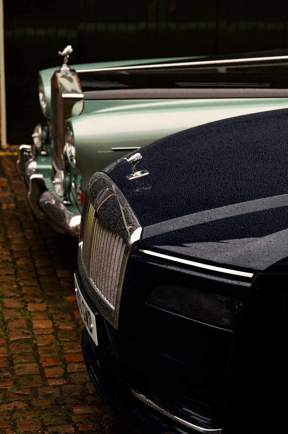 ROLLS-ROYCE SPECTRE BESIDE A 1965 ROLLS-ROYCE SILVER CLOUD COUPÉ IN ONE OF LONDON'S MOST DESIRABLE DISTRICTS