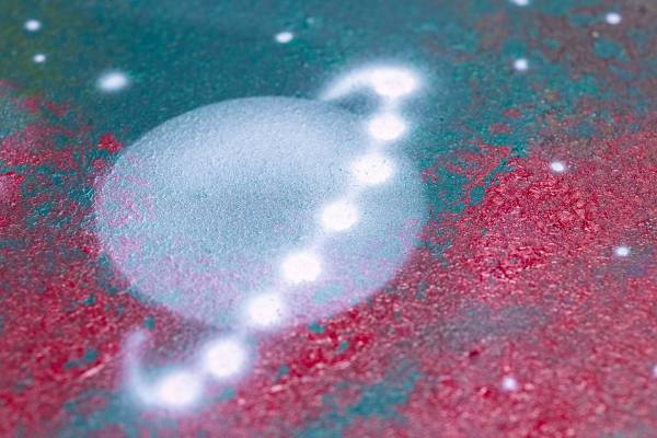 CYRIL KONGO HAND-PAINTING THE STARLIGHT HEADLINER AT ROLLS-ROYCE