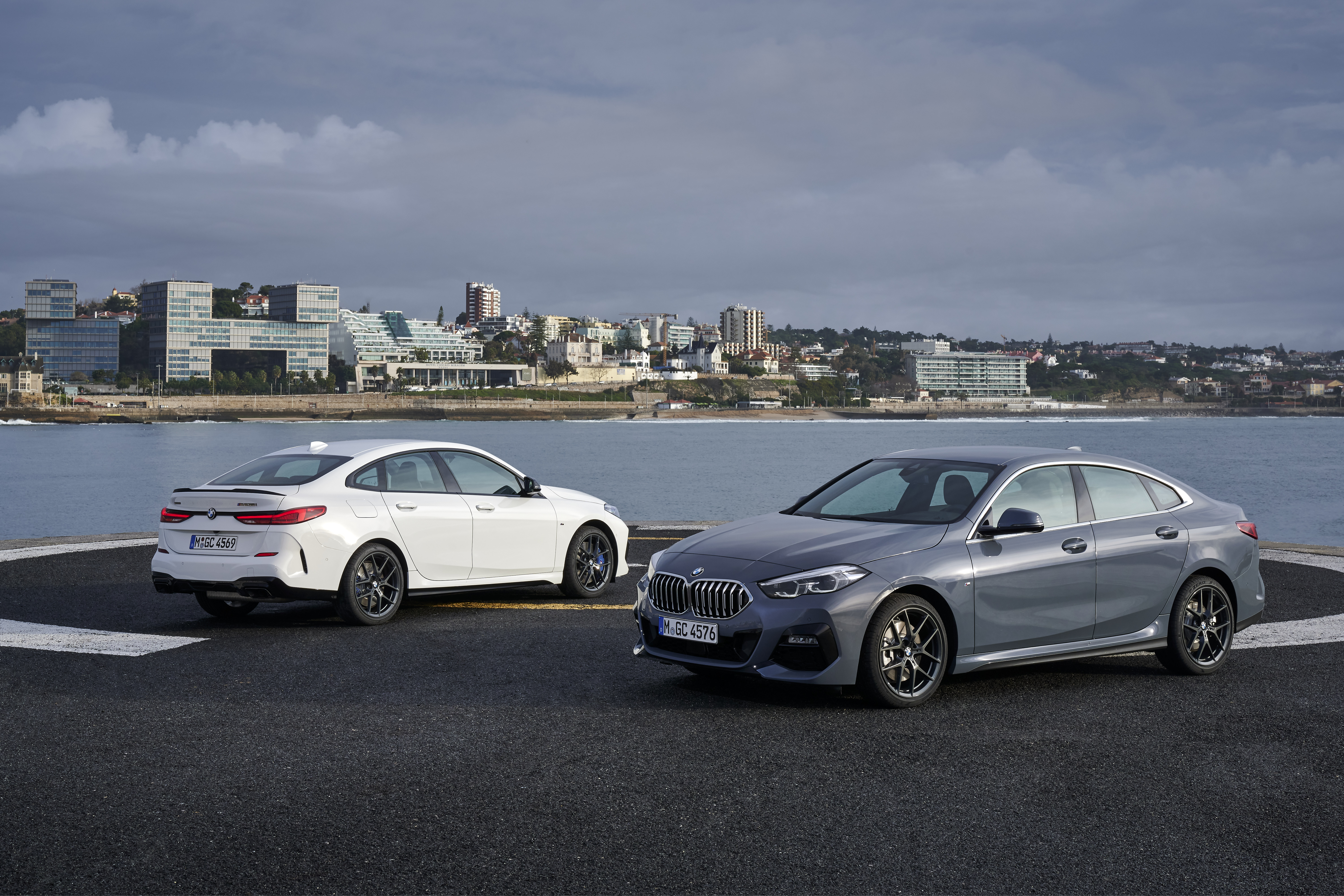 The first-ever BMW 220d Model M Sport Gran Coupe (Storm bay metallic) and the  first-ever BMW M235i xDrive Gran Coupe (Alpine white) (02/2020).